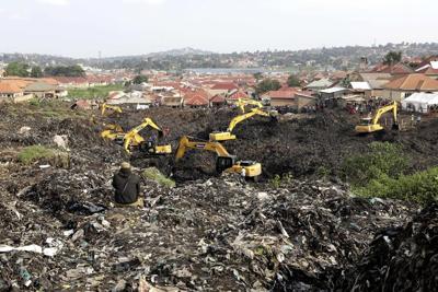 Death toll in Uganda rubbish heap collapse reaches 24 as rescue teams find more victims