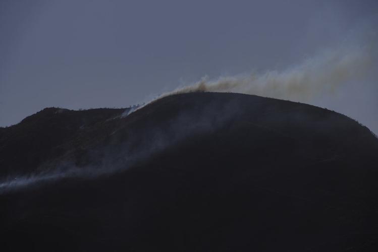 Southern California rain helps firefighters but creates risk of toxic ash runoff