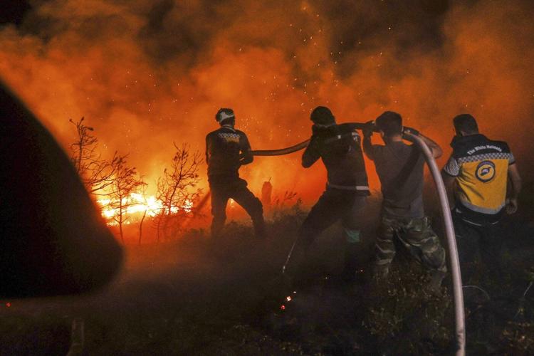 Syrian wildfires spread due to heavy winds and war remnants