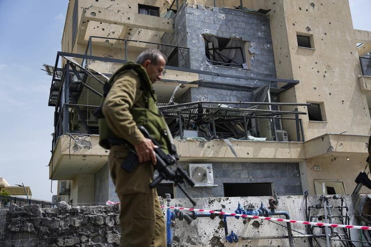 Israel bombards Beirut suburbs as its leadership prepares to vote on ceasefire with Hezbollah
