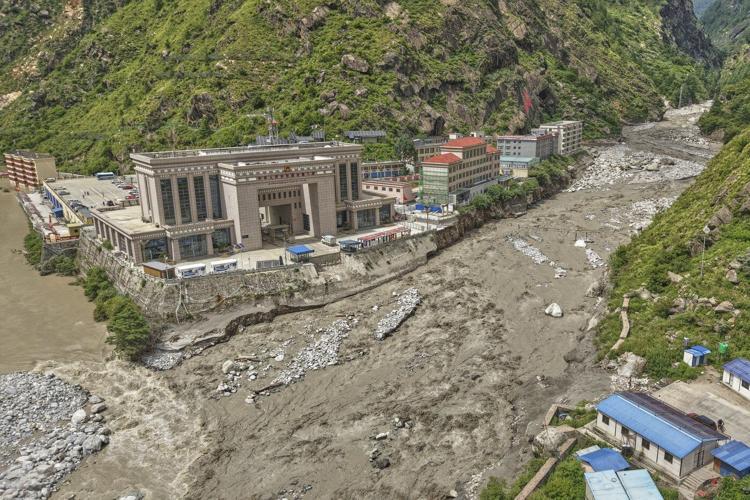 Rescuers search for 19 missing and recover 9 bodies after flooding in Nepal