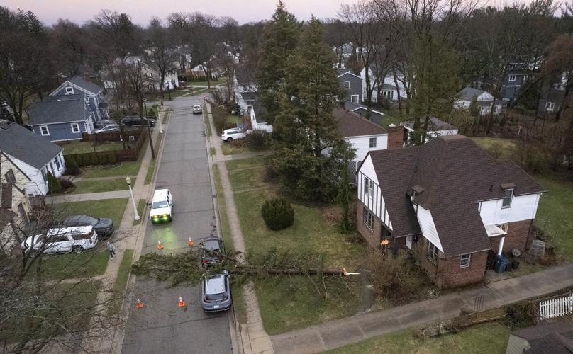 3 killed when tree hits vehicle in Michigan and damage reported in Tennessee amid widespread storms