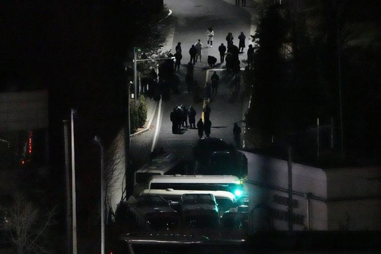 South Korean law enforcement officers enter presidential compound to detain impeached Yoon