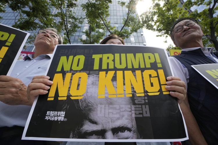 The Latest: Trump triumphant over new tariffs regime, but concerns abound