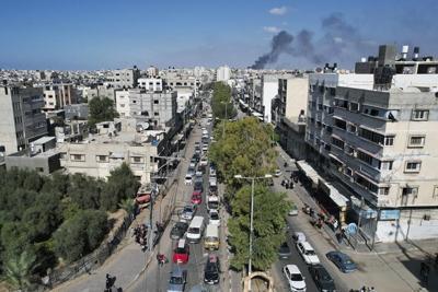 Weary families trudge through Gaza streets, trying to flee the north before Israel's invasion