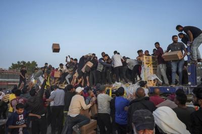 UN food agency pauses its aid work at US pier in Gaza over security concerns, in latest setback