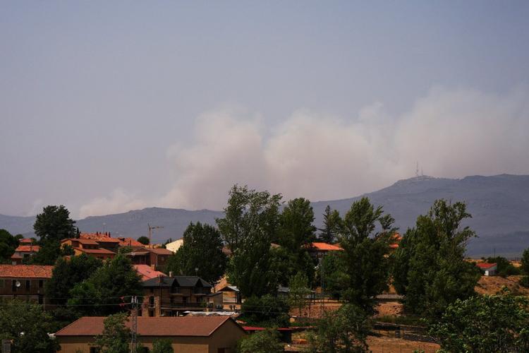 Firefighters battle one of Spain's biggest-ever wildfires during heat wave across the Mediterranean