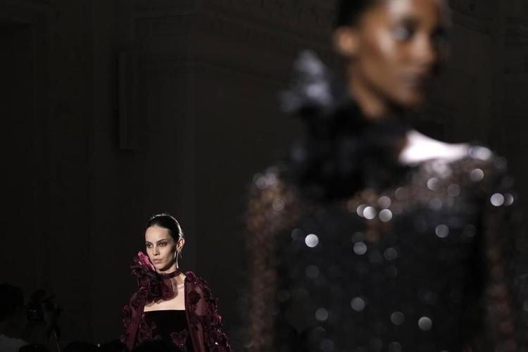 The Paris Couture Week runways see a moody midnight showing and an airy vintage display