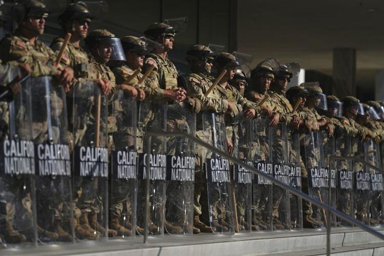 The Latest: Protests over immigration raids spread across the US