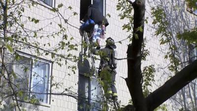 Residents jump from windows during Milwaukee apartment fire that kills 4