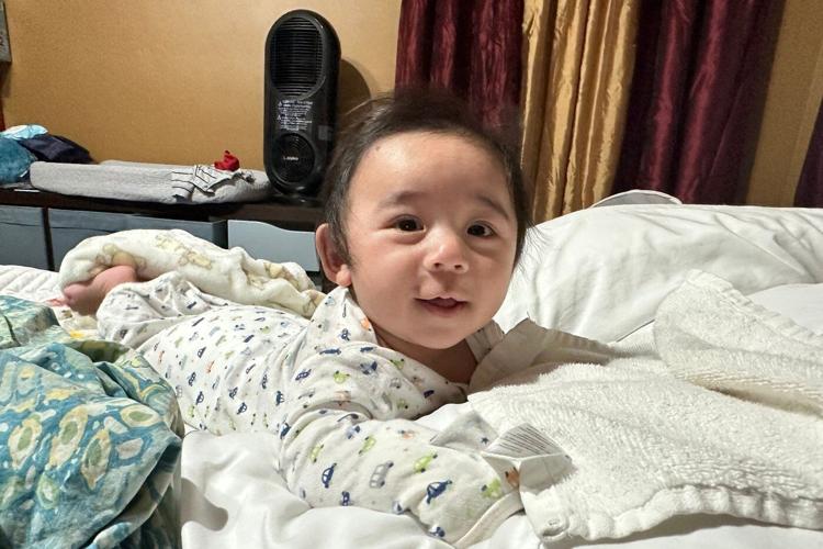 'The best gift ever': Baby is born after the rarest of pregnancies, defying all odds