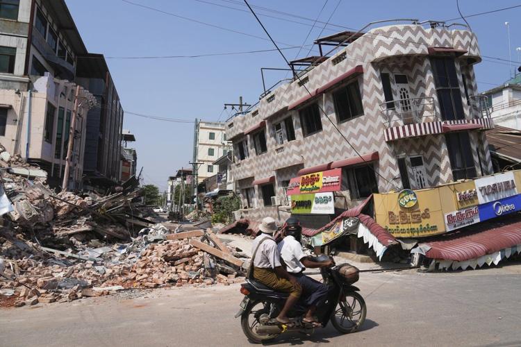 Smell of death permeates Myanmar cities after quake kills over 1,600 and leaves countless buried