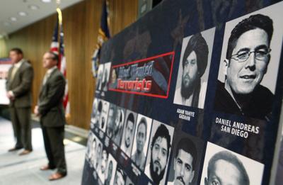 A fugitive wanted in the US for a pair of bombings is arrested in the UK after 20 years on the run