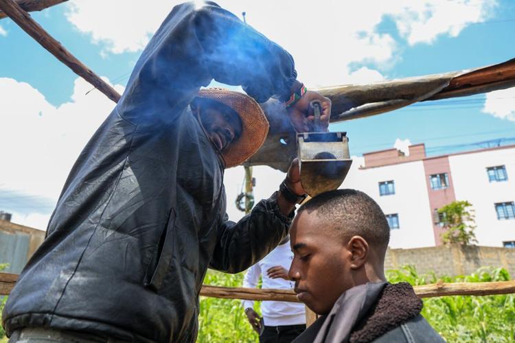 A Kenyan barber who wields a sharpened shovel thrives on Africa's social media craze
