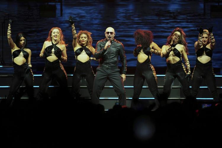 Pitbull is a fan of his fans. He says it's his job to make them feel good