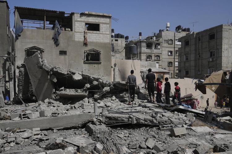 A missile from Yemen halts flights in Israel hours before top officials vote on plans for Gaza war