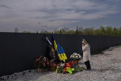 Long days of gravediggers tell story of Ukraine's war dead