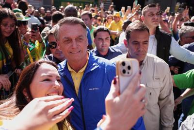 Brazil's Bolsonaro echoes Trump by describing coup plot trial as a 'witch hunt'