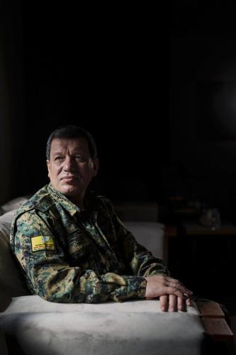 US-backed commander says his Kurdish-led group wants a secular and civil state in post-Assad Syria
