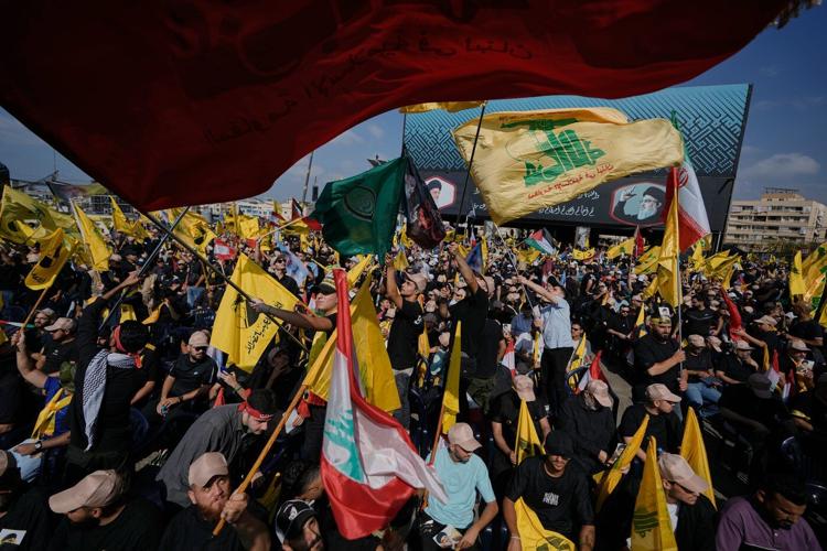 Photos show Hezbollah supporters honoring slain leaders Nasrallah and Safieddine despite PM's ban