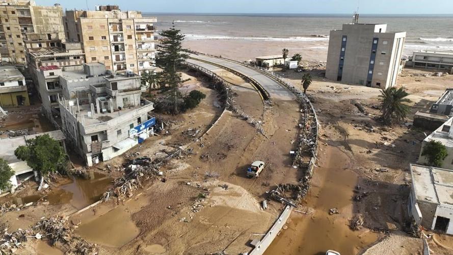 Searchers race to recover bodies in Libya as death toll from flooding hits 5,100