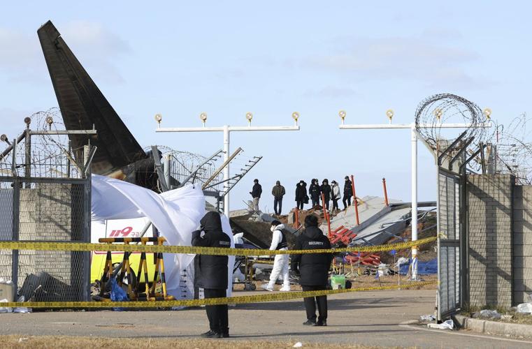 US and Boeing investigators examine the site of a deadly South Korean plane crash