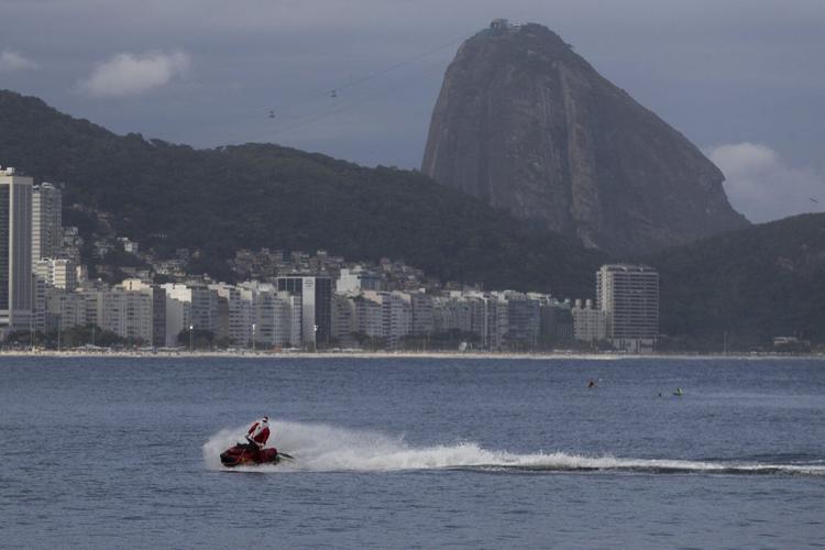 Brazilian Santa swaps sleigh for Jet Ski to deliver toys - and joy - to disabled children in Rio