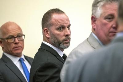 Witness testifies he didn't see a gun in the hand of a man who was killed by an Ohio deputy
