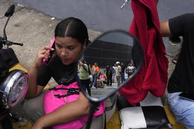 An aid worker's airport disappearance stirs fear of repression following disputed Venezuela election