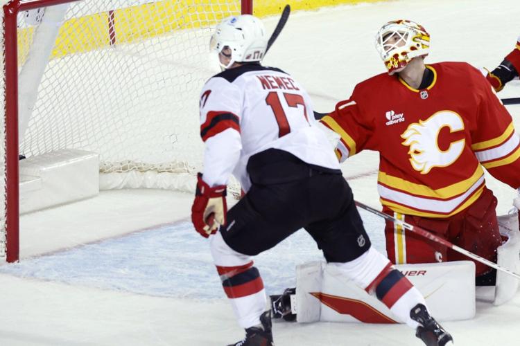 Nemec scores in OT as Devils douse Flames 2-1