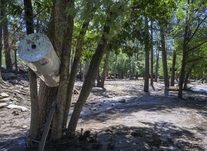 New Mexico mountain village braces for more rain following deadly flash flooding