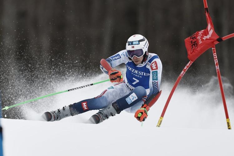 Swiss ski star Odermatt secures overall and GS World Cup titles in race won by teammate Meillard