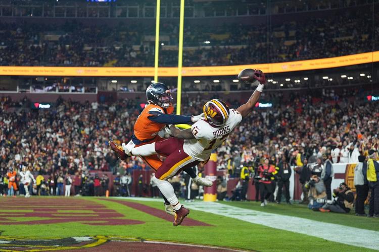 Catch of the year? Commanders' Treylon Burks makes incredible 1-handed TD grab vs. Broncos