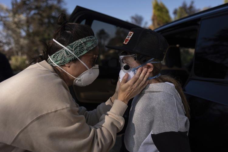 Parents and kids navigate talks of loss and tragedy as they return home after LA area fires
