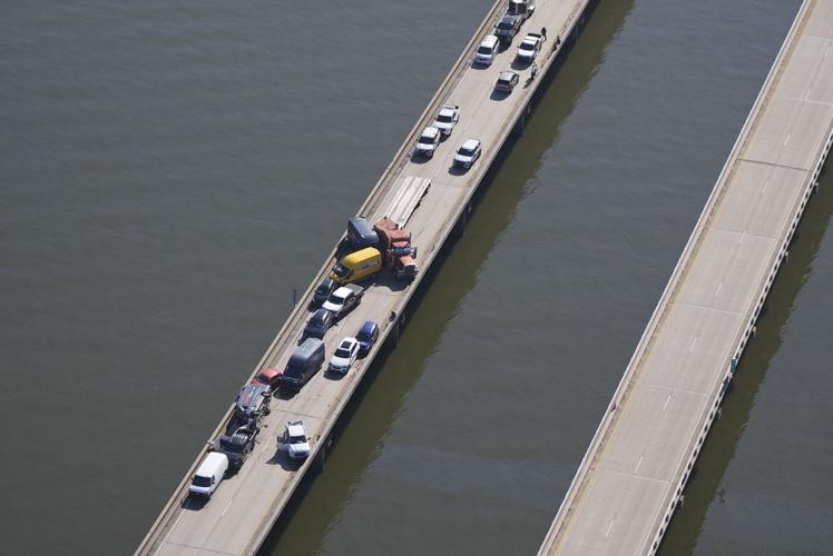 Multiple car crashes close 24-mile-long bridge outside of New Orleans after sudden fog