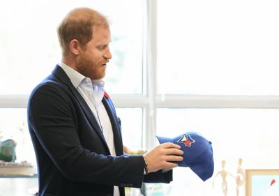 Prince Harry jokes he was 'under duress' while wearing Dodgers cap at World Series