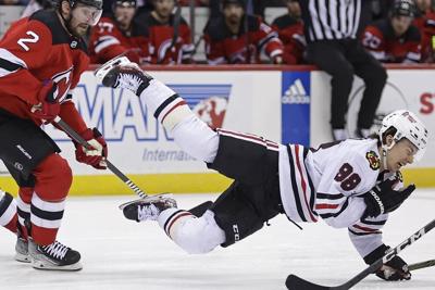 Blackhawks' Bedard breaks his jaw, pausing the No. 1 pick's stellar start to career