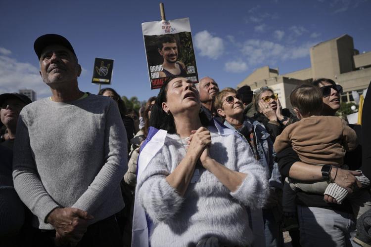 Hamas says it will delay the release of more hostages, putting Gaza ceasefire at risk