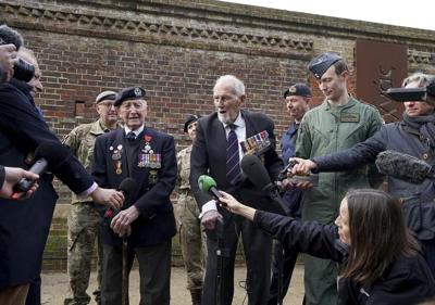 D-Day vets in Britain honor comrades as 13 names are added to a memorial