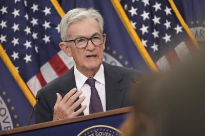 Powell signals Federal Reserve to move slowly on interest rate cuts
