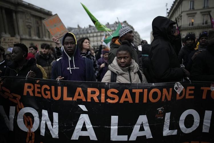 France's constitutional court rejects several measures in controversial immigration law