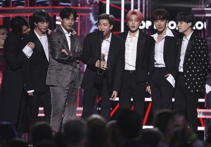 All of BTS has returned as Suga is discharged from an alternative form of military service