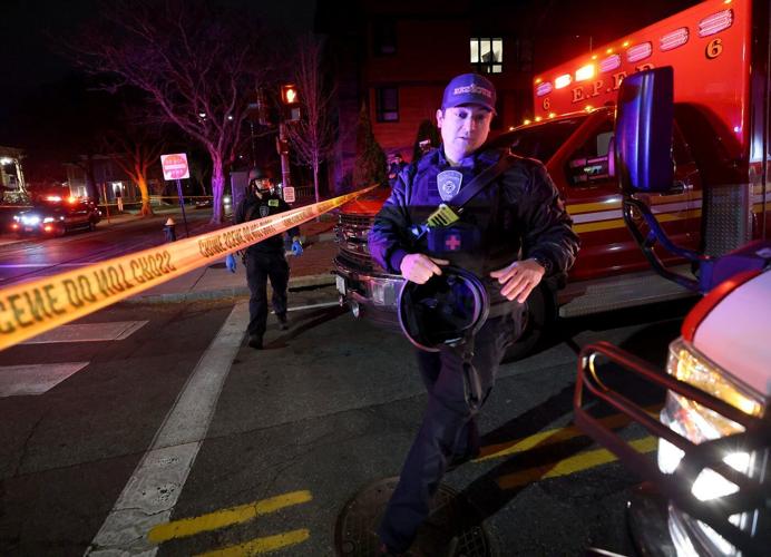 Photos show police investigation of a shooting at Brown University.