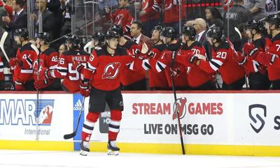 Devils beat Flames 3-2 for seventh straight win