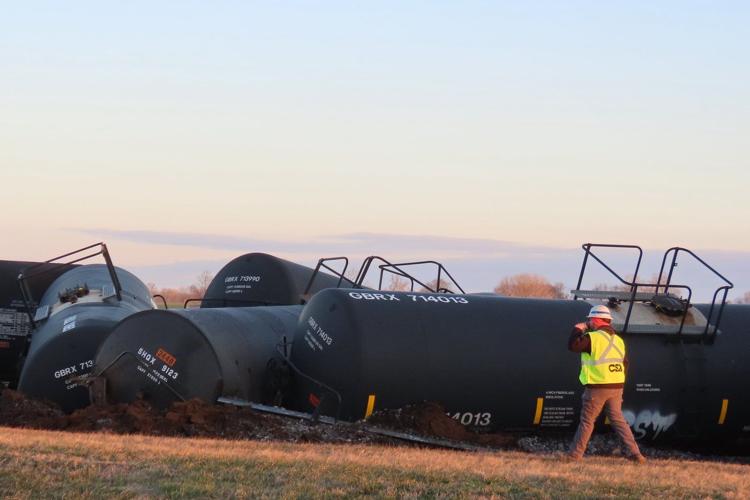 Derailed train in Kentucky causes a chemical leak and sparks a fire