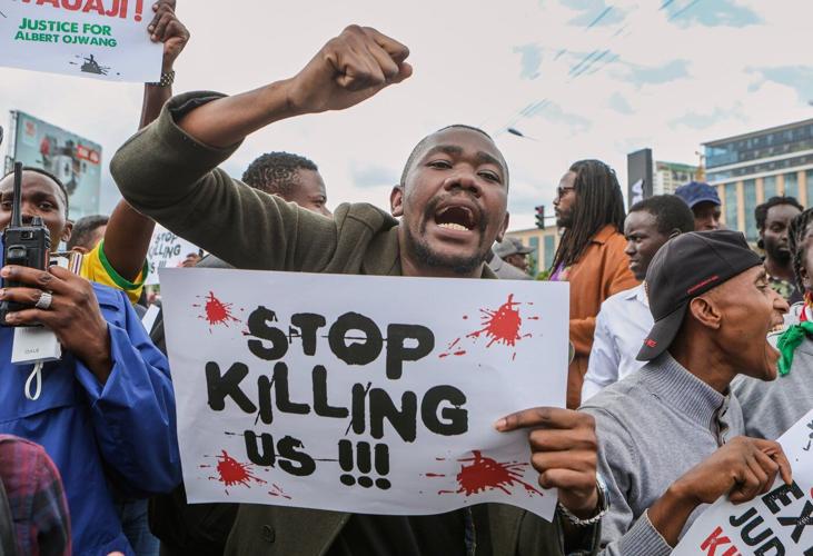 Police tear gas activists protesting the death in police custody of a Kenyan blogger