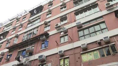 A cleaner finds 2 dead babies in glass bottles in a vacated Hong Kong apartment. Police arrest 2
