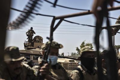 US-backed Kurdish forces impose curfew in eastern Syria after new clashes with rival Arab militia