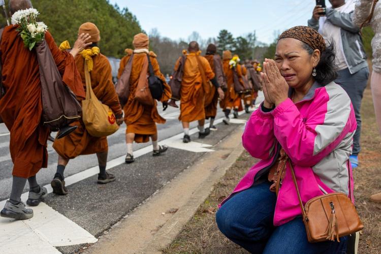 Buddhist monks persist in peace walk despite injuries as thousands follow them on social media