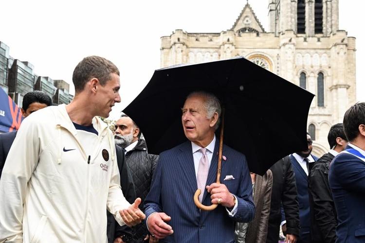 British royals sprinkle star power on a grateful French town with up-and-down ties to royalty
